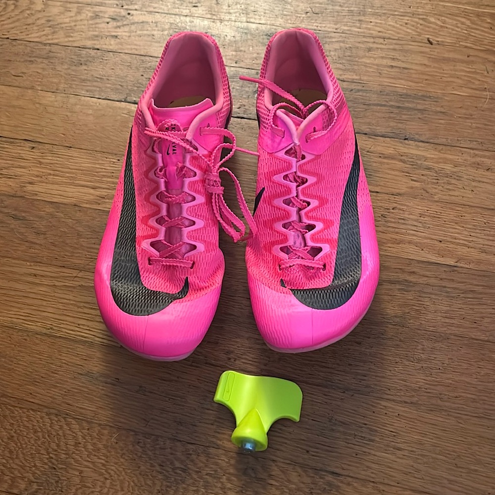 Nike women’s multi event track spikes. Size 9 in pink